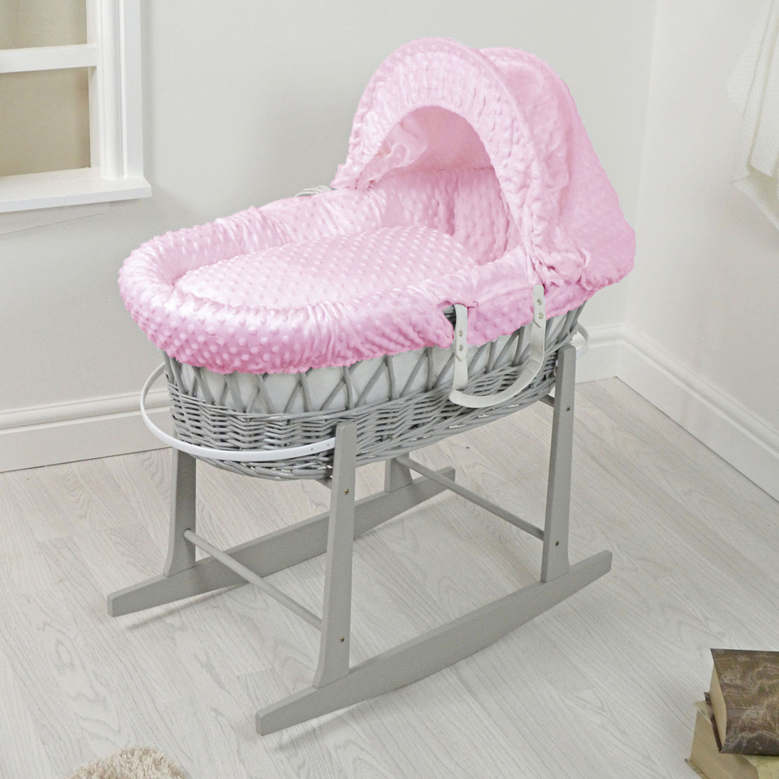 grey and pink moses basket with stand